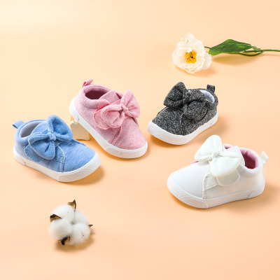 Zapatos de velcro con decoración de lazo de color liso para niña pequeña