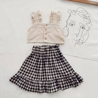 Girls suit with short suspender top and plaid skirt  Beige