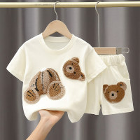 Children's clothing 2023 summer new products, small and medium-sized children's suits for boys and girls, Korean version solid color cartoon patches, foreign style tops and shorts  White