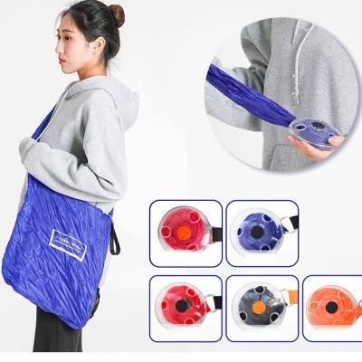 Portable foldable telescopic small disc shopping bag storage bag rotating disc bag five colors optional shopping bag recyclable