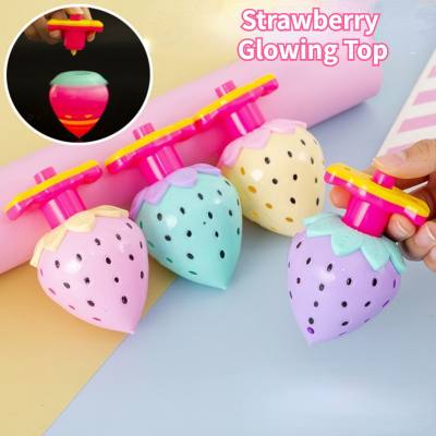 Glowing berry spinning top launcher toy