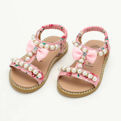 Sandali con fiocco di perle per bambina