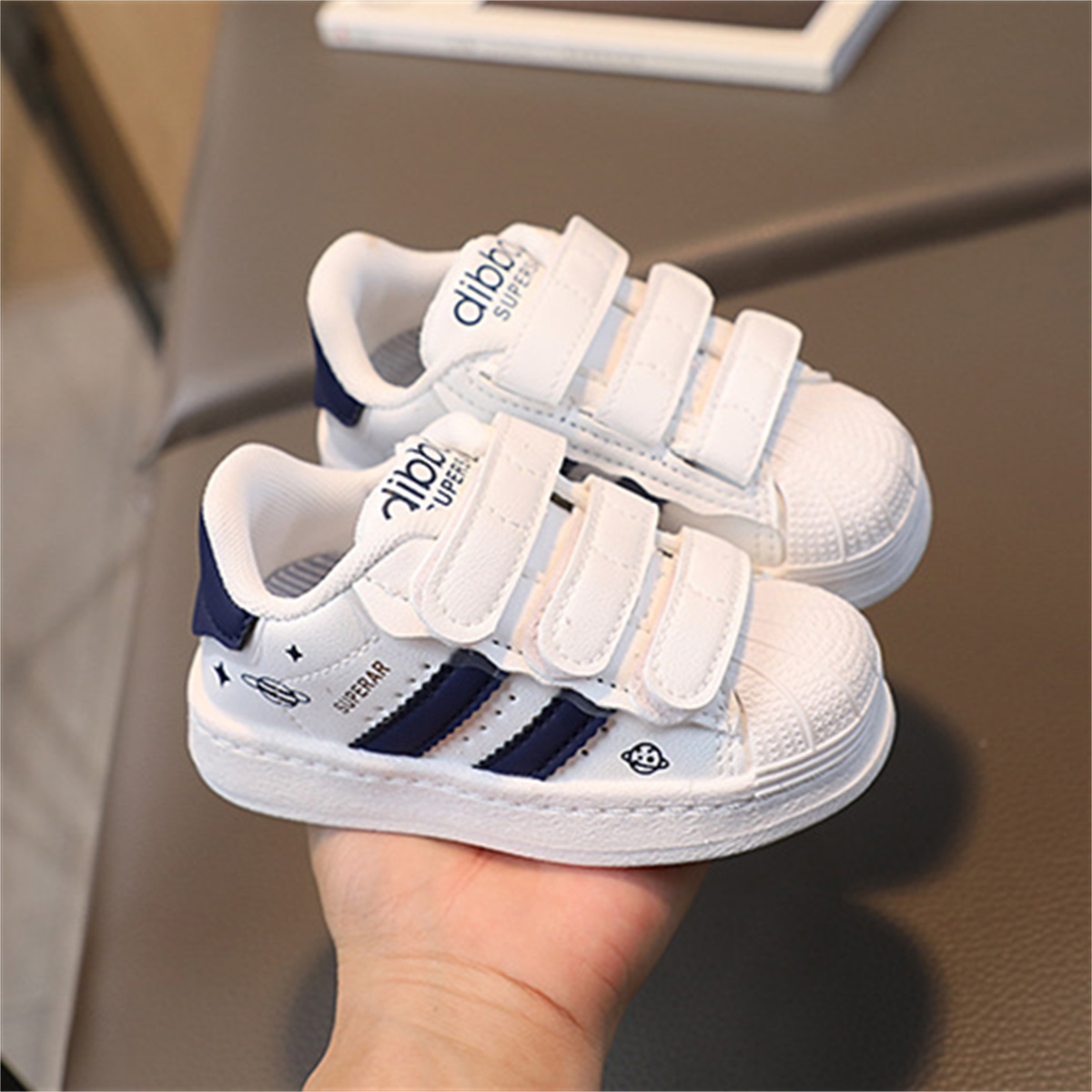 Children s striped print white shell toe sneakers