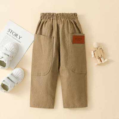 Pantalones casuales de bolsillo delantero de color sólido para niños pequeños
