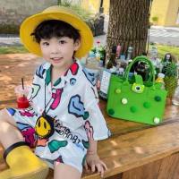 Costumes pour garçons et filles vêtements d'été nouveau bébé style coréen beau vêtements de plage shorts chemise ensemble deux pièces pour enfants de petite et moyenne taille  blanc