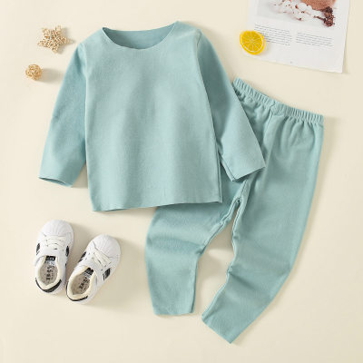Pijama de camiseta y pantalones de color liso para niños pequeños