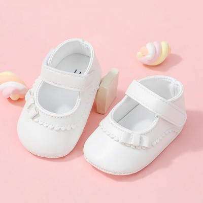 Zapatos de velcro de suela blanda con decoración de lazo de color sólido para niña bebé