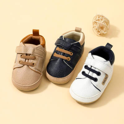 Chaussures en cuir de couleur unie pour bébé