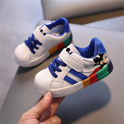 Zapatillas deportivas bajas con patrón de dibujos animados a rayas de colores para niños pequeños