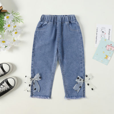 Jeans decorati stereoscopici con fiocco a pois per bambina