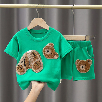 Children's clothing 2023 summer new products, small and medium-sized children's suits for boys and girls, Korean version solid color cartoon patches, foreign style tops and shorts