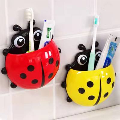 Creative children's toothbrush holder wall-mounted punch-free toothbrush and toothpaste storage rack bathroom hanging toothbrush holder wall-mounted