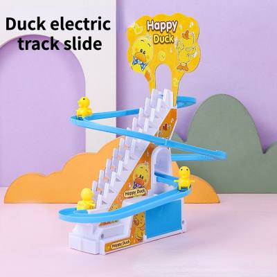 Pequeño pato amarillo que sube escaleras pista eléctrica música pequeño pato tobogán juguete educativo