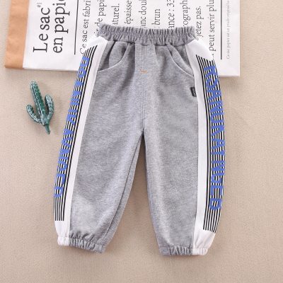 Pantalones casuales de rayas verticales con bloques de colores para niños pequeños