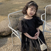 Vestido de princesa para niñas, versión coreana, novedad de verano, estilo infantil, vestido negro con temperamento, mangas abullonadas, vestido swing grande 2024  Negro
