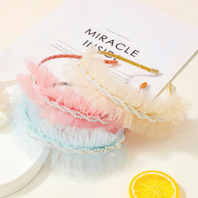 Fascia per capelli in rete con decorazioni di perle plissettate per bambina