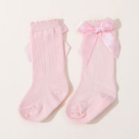 Calcetines de decoración con lazo de color liso para niña bebé  Rosado