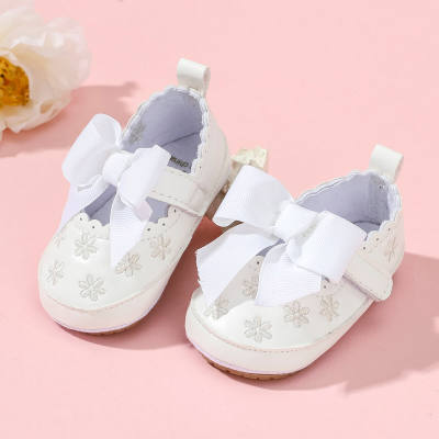 Sapatos de bebê com laço de cor sólida