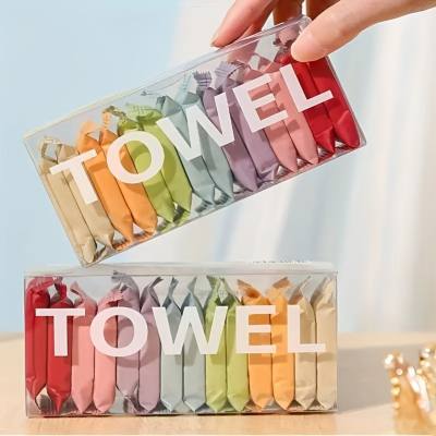 Disposable portable compressed towel individually packaged in box with colored face wash towel