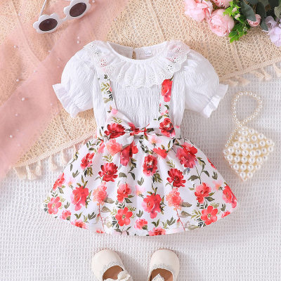 Cross-border 2024 summer lotus collar puff sleeves + printed suspender skirt fashionable and versatile casual two-piece set