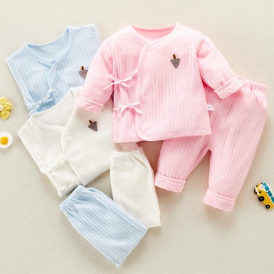 Haut et pantalon de pyjama à manches longues de couleur unie pour bébé