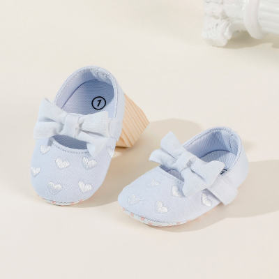Sapatos de bebê redondos em tecido de algodão