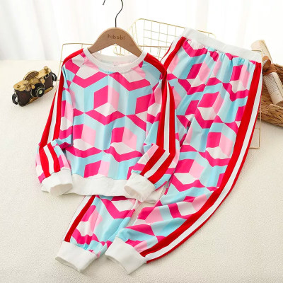 Conjunto de calças e jaqueta com zíper de blocos coloridos com estampa geométrica infantil