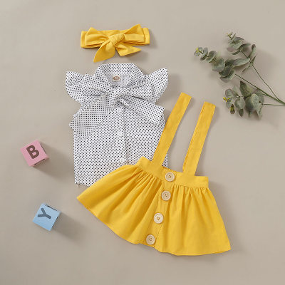 طقم بناتي ثلاث قطع تنورة علاقي لون اصفر +قميص اكمام قصيرة تشكيلة ربطة فيكونة نمط منقط مع ربطة راس للاطفال
