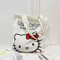حقيبة كتف قماشية لشخصية Sanrio Kuromi، مزيّنة بشعار عائلة KT الكرتونية، مناسبة للطلاب، تستوعب الوثائق بحجم A4، وتتميّز بتصميم جذاب ولطيف.  متعدد الألوان