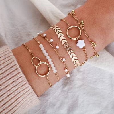 Japanese and Korean fashion Instagram style flower tassel round bead bracelet, European and American leaf geometric 6-layer beaded bracelet for women