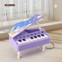 Mini piano portátil, piano tocável, console de videogame, chaveiro de brinquedo para presente  Roxa