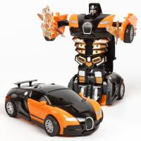 Kinderkollisions-Trägheitsverformungsauto prallt gegen Spielzeugauto  Orange