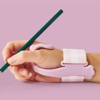 Anti-wrist hook corrector Student pen holding posture correction hook wrist corrector pen holding training artifact writing  Pink