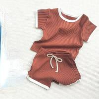 I pantaloncini a maniche corte in cotone a righe per neonati e bambini in stile estivo coreano si adattano ai vestiti per bambini in due pezzi alla moda, comodi e carini  Rosso