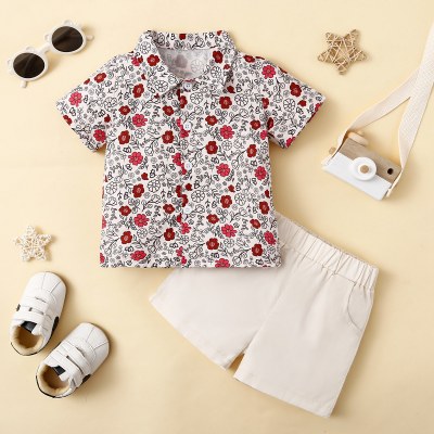 Camisa de manga curta com estampa floral estampada infantil de 2 peças e shorts de cor sólida