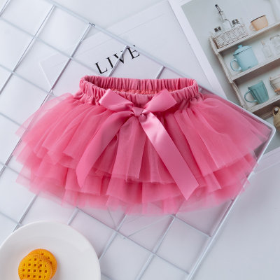 Falda de malla con lazo en color liso para bebé niña