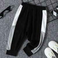 Pantaloni in maglia a righe per neonato  strisce bianche e nere