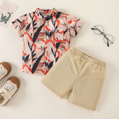 T-shirt et short à col montant et motif de feuilles tropicales pour bébé garçon