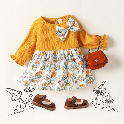 Vestido de manga larga con decoración de lazo y bloque de color floral para bebé