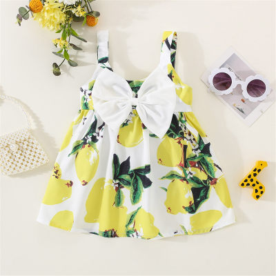 Vestido de tiras decorativas con lazo y estampado de limón para niña pequeña