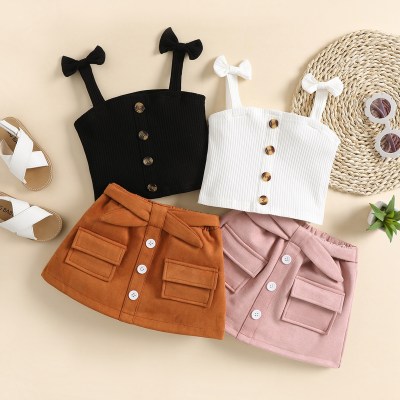 Baby Girl Solid Color Bow-knot Halter Top & Solid Color Pocket Decor Skirt