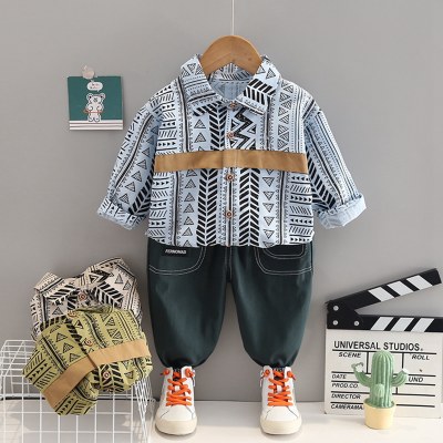 2-piece Toddler Boy Allover Printed Patchwork Long Sleeve Shirt & Solid Color Pants