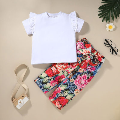 Camiseta infantil de 2 peças de algodão puro de cor sólida com babados e calça com padrão floral