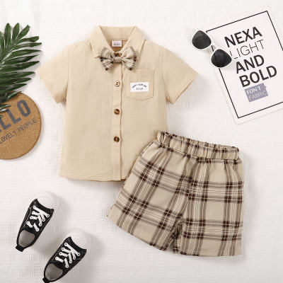 2-piece Toddler Boy Solid Color Bowtie Decor Short Sleeve Shirt & Plaid Shorts