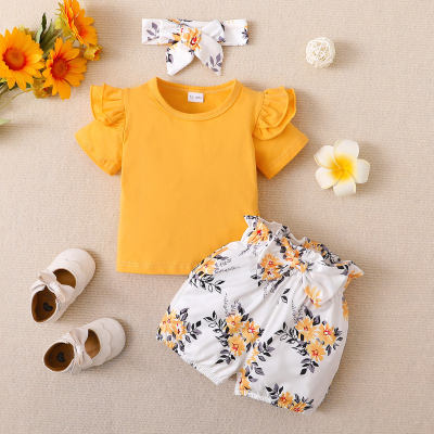 2 peças de camiseta infantil de manga curta de cor lisa e shorts com estampa floral