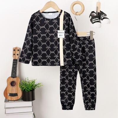 2-piece Toddler Boy Allover Printed Patchwork Long Sleeve Top & Matching Pants