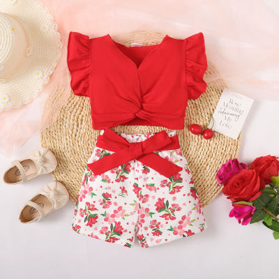 Blusa sin mangas con cuello en V de color sólido para niña pequeña de 2 piezas y pantalones cortos con estampado floral completo