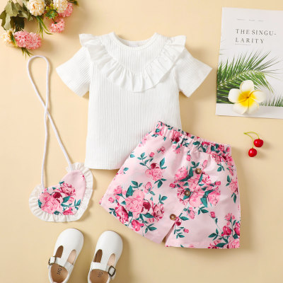 Blusa de manga curta com babados de cor lisa de 3 peças e shorts com padrão floral e bolsa de coração
