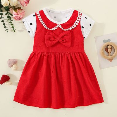 Vestido de manga corta con decoración de lazo y lunares con solapa de retazos de bloque de color de algodón puro para niña pequeña