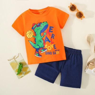 Camiseta con estampado de letras y dinosaurios de algodón puro para niños pequeños de 2 piezas y pantalones de color sólido